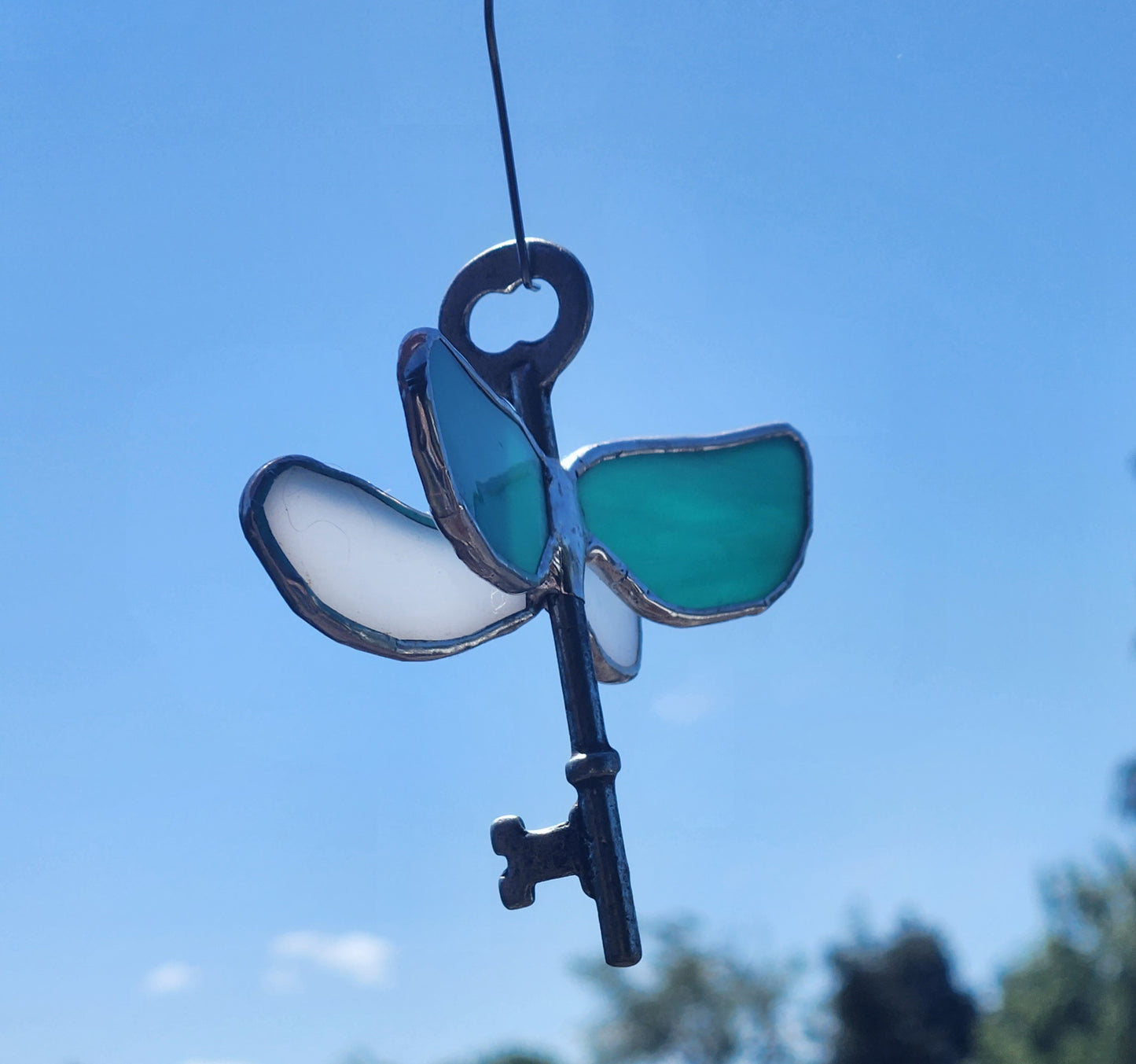 Teal and White Stained Glass Flying Key