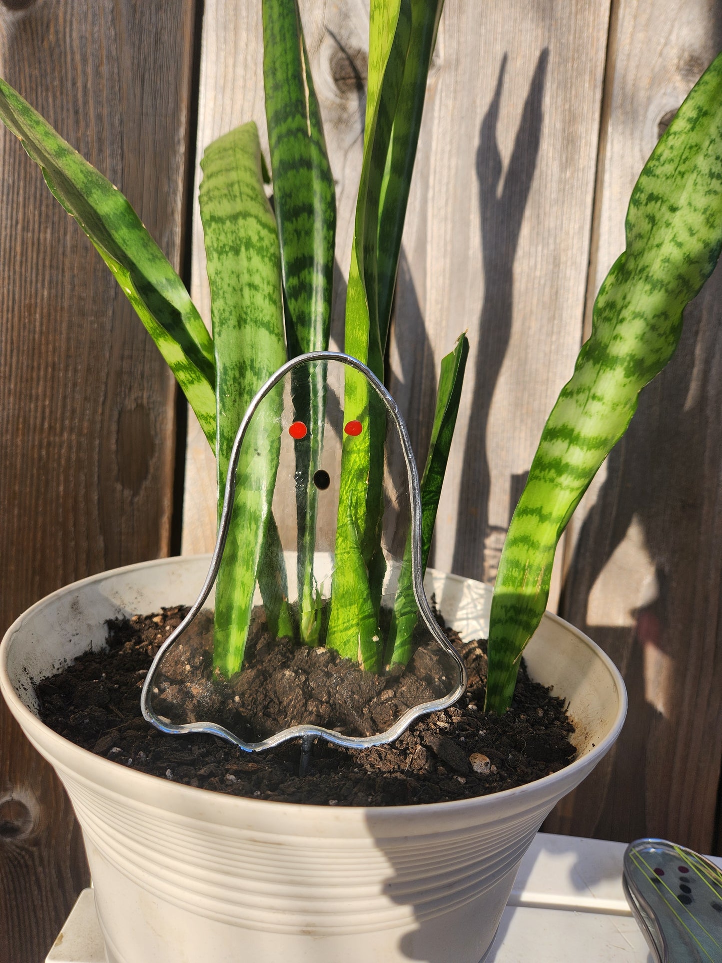 Ghost Stained Glass Plant Stake- Clear Swirl Glass with Red Eyes