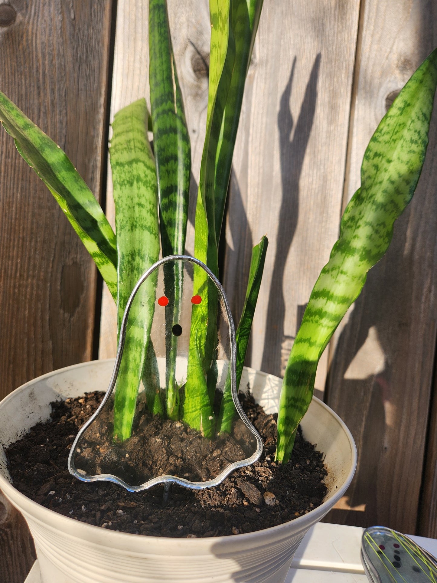 Ghost Stained Glass Plant Stake- Clear Swirl Glass with Red Eyes