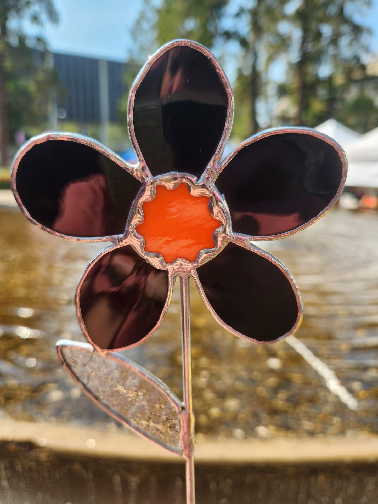 Black Waterglass Stained Glass Daisy Plant Stake with Orange Scallop Center