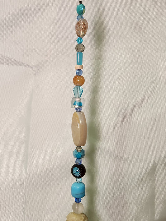 Turquoise and Peach Suncatcher