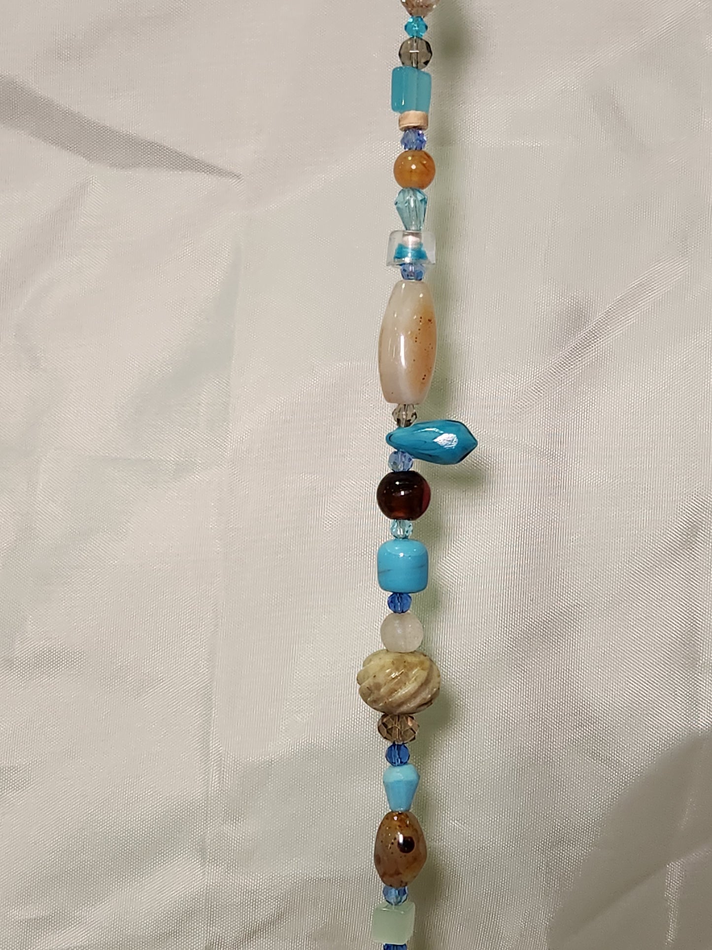 Turquoise and Peach Suncatcher