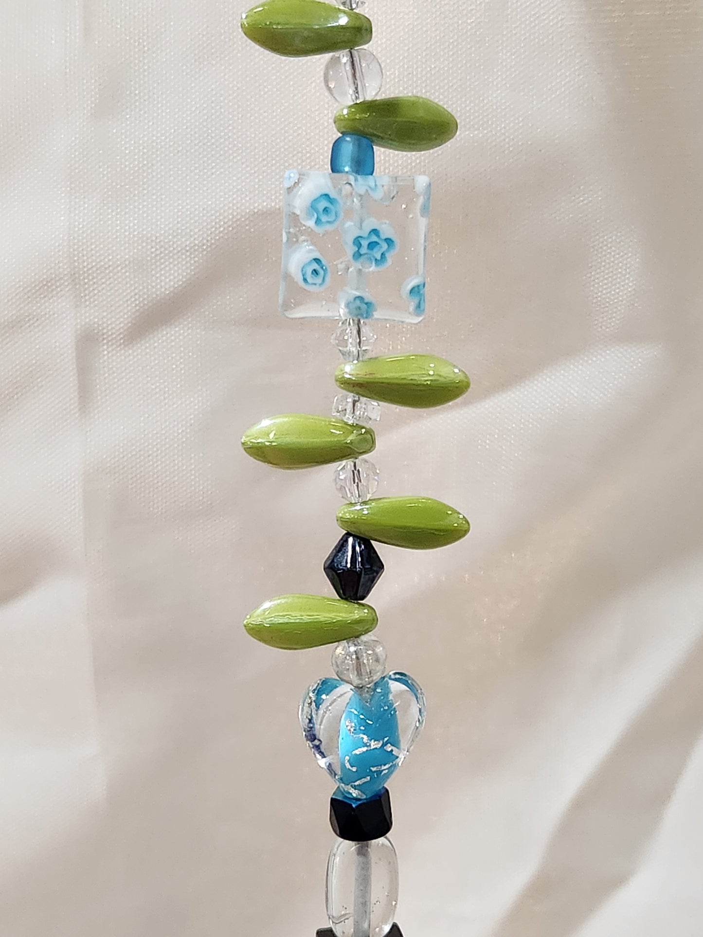 Light Blue, Black and Green Petals Suncatcher