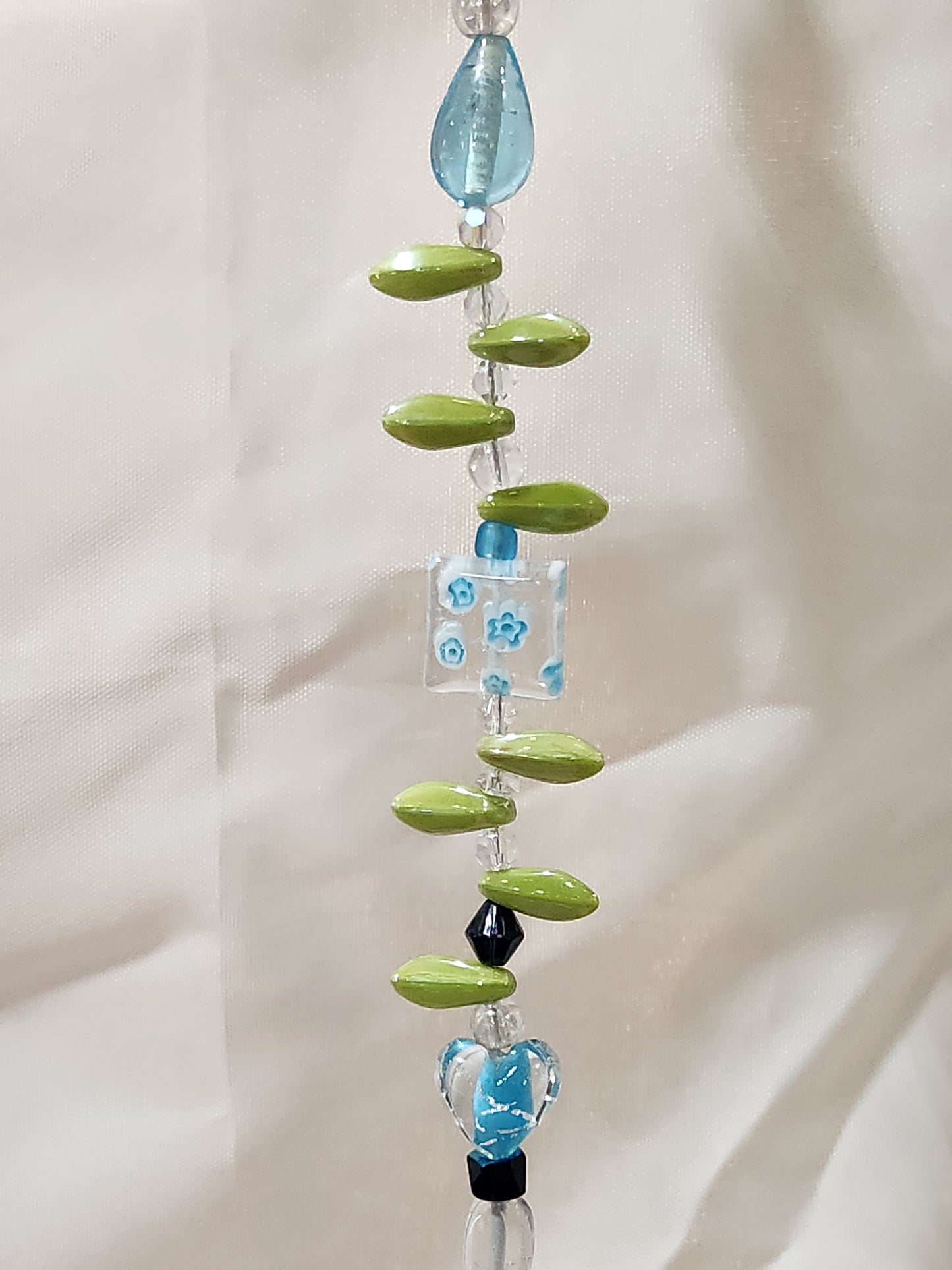 Light Blue, Black and Green Petals Suncatcher