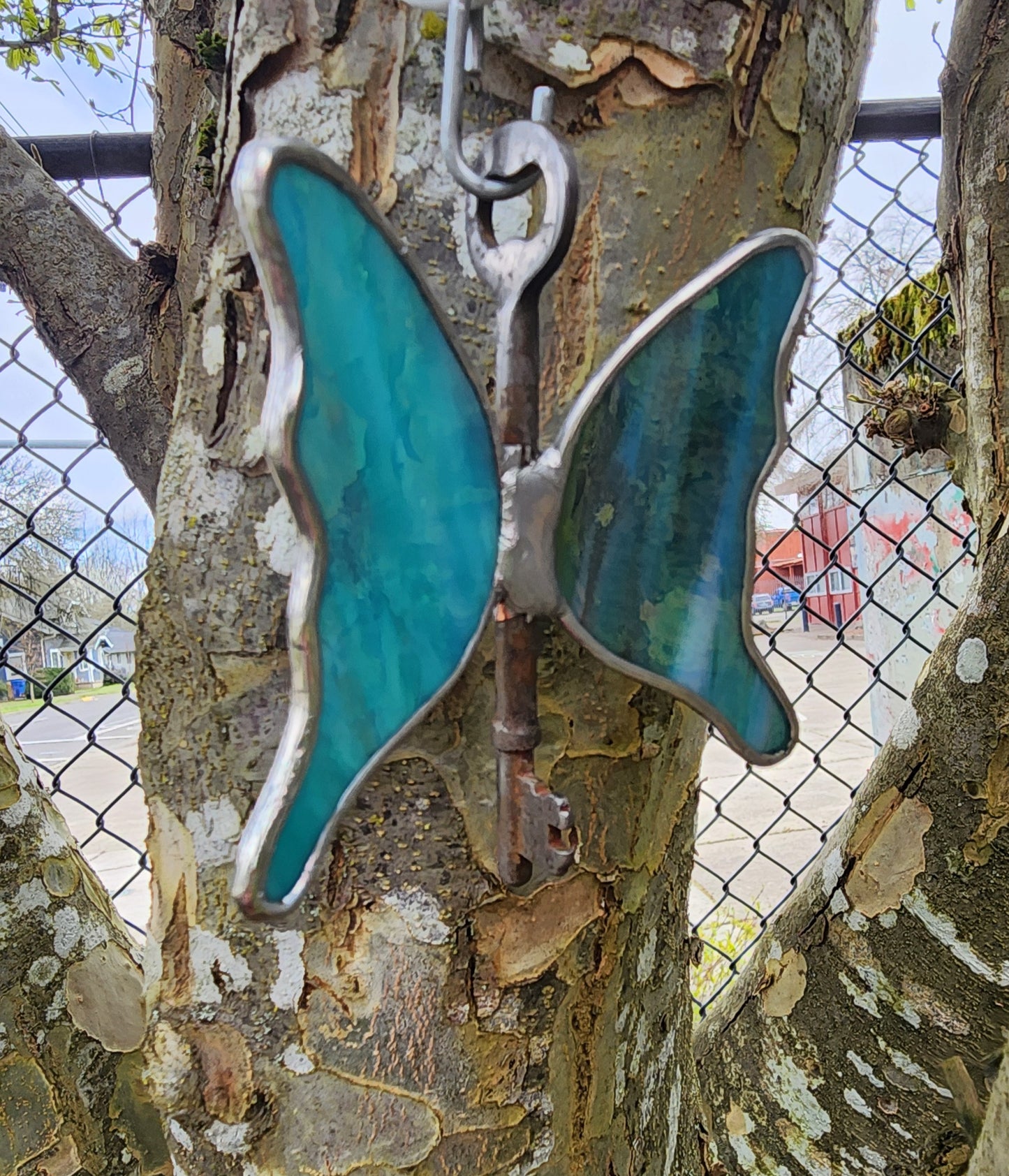Iridescent Teal Stained Glass Flying Key