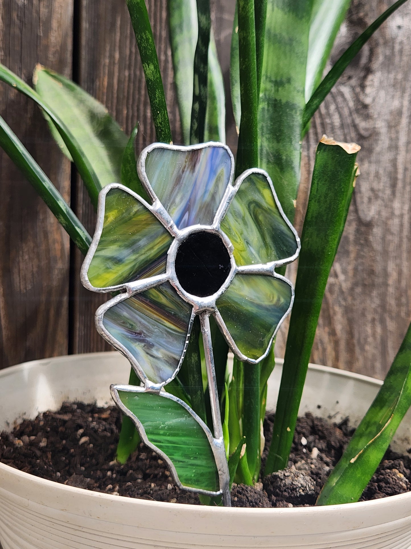 Opaque Green/Blue Streaky Stained Glass Wavy Flower Plant Stake with Dark Purple Glass Center